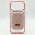 Phone case studded with Swarovski stones and framed by sparkling diamonds.